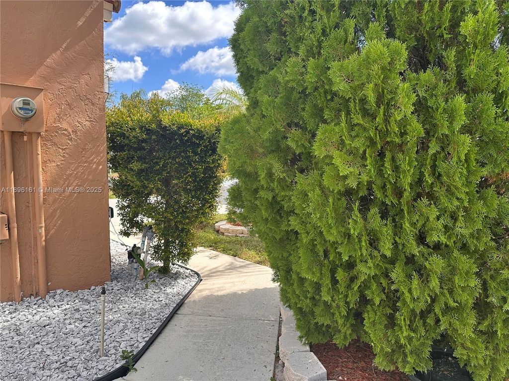 Photo of 113 Rosewood Ln, Green Acres, FL 33463 (MLS # A11896161)