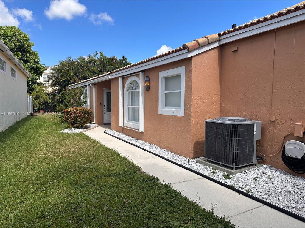 Photo of 113 Rosewood Ln, Green Acres, FL 33463 (MLS # A11896161)