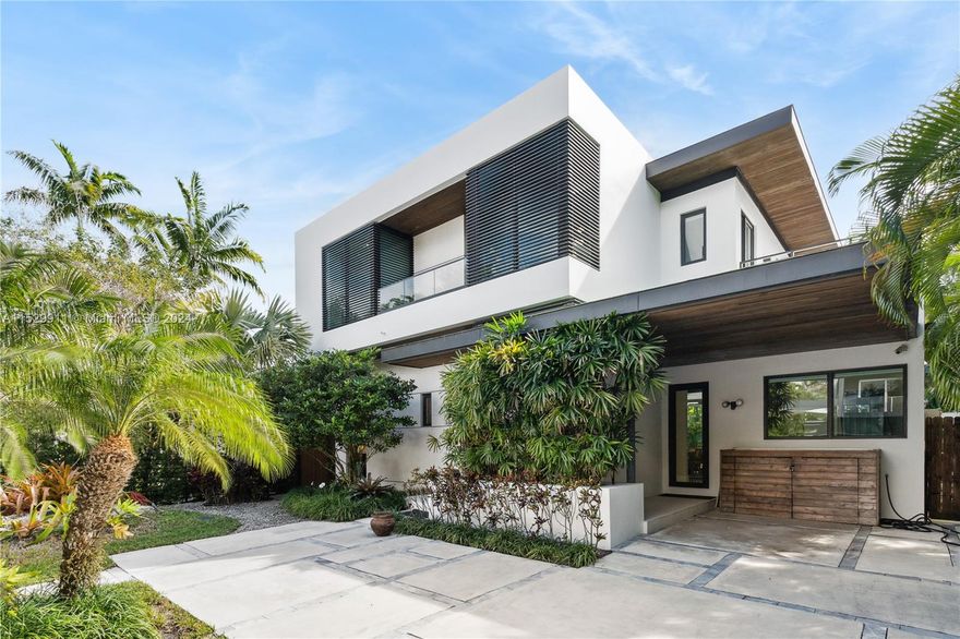 Experience the epitome of modern luxury in this 4-bed, 4.5-bath Miami residence within the premier school district. The South Grove home features a luminous open floor plan with three upper-level bedrooms, each with its own ensuite, while the primary bedroom offers captivating pool views. Unwind in the backyard oasis of this Grove home, with a heated pool, spa, and a spacious covered patio. Cutting-edge amenities include a commercial-grade generator, Wolf appliances, electric blinds, Trane A/C, and an extensive automation system. The 1000 sq ft outdoor patio, with automatic screens and a well-equipped kitchen, beckons for entertainment. This South Grove haven seamlessly combines contemporary elegance with comfort, offering a modern living experience like no other.