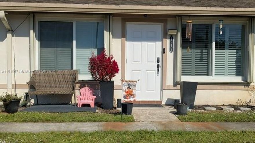 Live in the heart of Davie in this beautifully maintained 2-bedroom, 2-bath single-story townhome in the desirable Arrowhead community. This charming home features wood floors, plantation shutters, a bright eat-in kitchen, full-size washer and dryer, and both a screened-in patio and an additional outdoor patio for relaxing or entertaining. Fiber-optic internet and smart-home features add modern convenience, and accordion hurricane shutters offer extra peace of mind. The perfect blend of comfort, convenience, and location. Near Nova University, I-595, I-75, FLL Airport, and Sawgrass Mills.