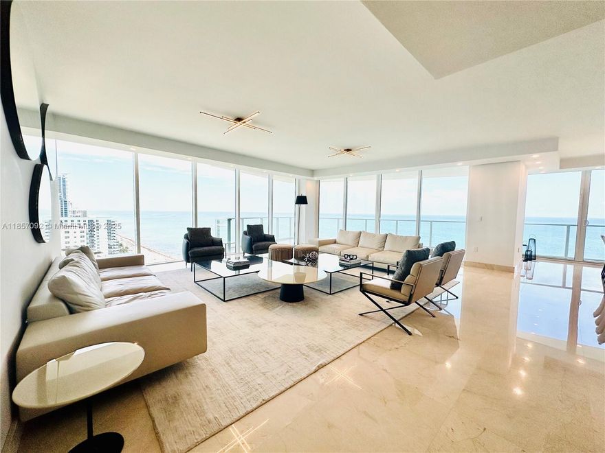 Experience the epitome of oceanfront luxury in this stunning 4-bedroom plus den, 4.5-bath residence offering unobstructed, panoramic ocean views. This turnkey home is elegantly appointed and fully furnished, ready for immediate enjoyment.
The expansive, light-filled floor plan features floor-to-ceiling glass, a gourmet kitchen, and spacious living areas that flow seamlessly onto the spacious balcony. Each bedroom offers en-suite luxury, while the versatile den provides an ideal space for an office, media room, or guest retreat.
The unit includes 3 parking spaces and a private beach cabana, ensuring the ultimate in convenience and exclusivity. Residents enjoy access to world-class amenities and a coveted location on South Ocean Drive, minutes from fine dining, shopping, and entertainment.