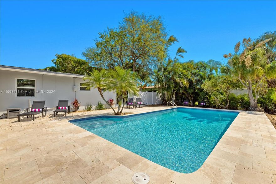 Escape the chaos of everyday life in this serene recently renovated pool home with a 2-car garage in the sought after Wilton Manors neighborhood. Built on an oversized corner lot, this spacious home features a generously sized living/dining room plus a separate family room that opens to the kitchen. Recent updates include new roof (2020), solar panels, hurricane impact windows and doors, renovated kitchen and baths, updated electrical and plumbing systems and a new resurfaced pool and deck. Plenty of parking with a circular driveway in the front and a separate driveway for the garage on the side. Just a 10-minute stroll to the shops and eateries of Wilton Drive, and minutes away from downtown Fort Lauderdale, I-95, FLL airport and the beach. Tranquility and relaxation await you.