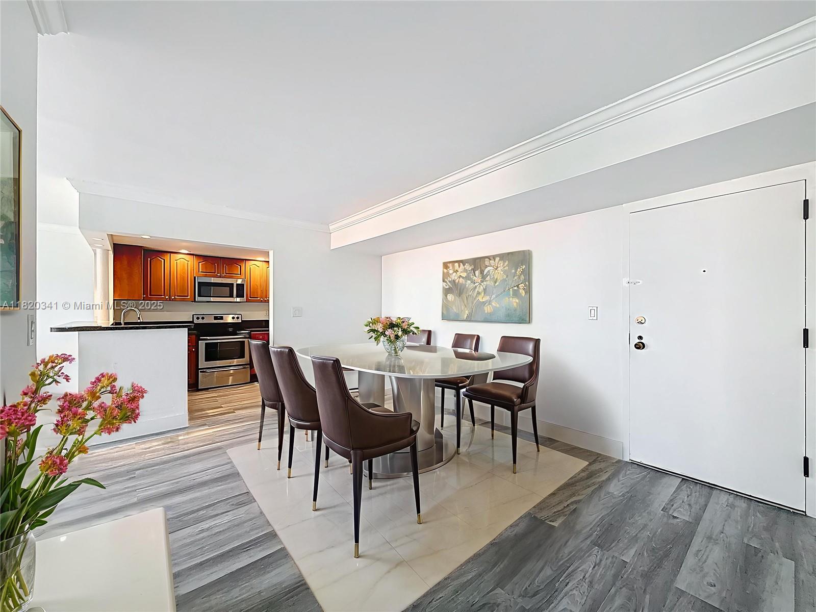 Welcome to Unit 501 at luxurious Gables Park Tower — This spacious and bright unit is situated in a boutique-style building with only 4 units per floor, providing privacy. Unit has an open floor plan, adjacent living & dining areas, amazing city views, freshly painted, new floors, S.S. appliances, washer and drying in unit, covered balcony, floor-to-ceiling windows, blackout window treatments.
Enjoy the proximity to Miracle Mile with access to dining, shopping, and cultural landmarks. The building features a renovated lobby, new elevators, secured access, dedicated parking, additional guest, pool and well-maintained common areas. Some pictures virtually staged. 40 year recertification completed. Call today to schedule your showing! Some pictures virtually staged.