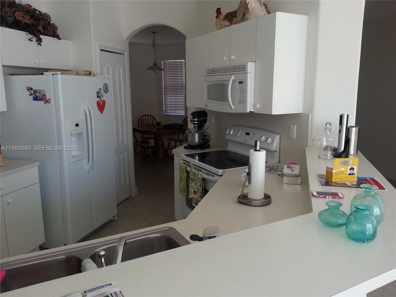 ISLANDS AT DORAL TOWNHOME - Residential