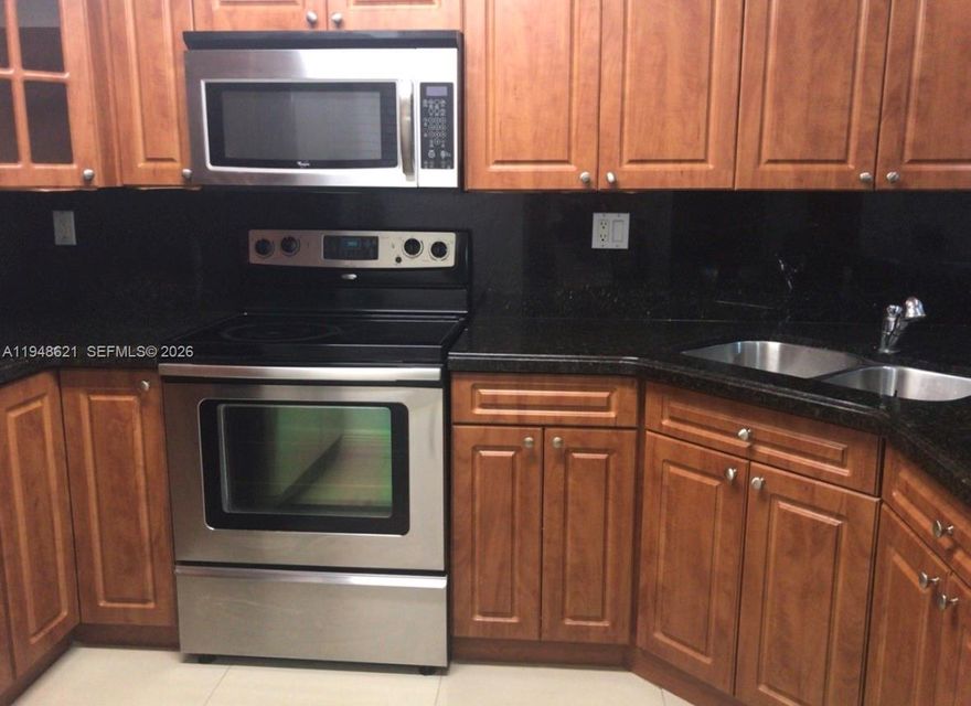Nice and well located 2 bedroom apartment with two bathroom , tile floors, granite counter tops , stainless steel appliances, new washer and dryer, patio. Two assigned parking spaces