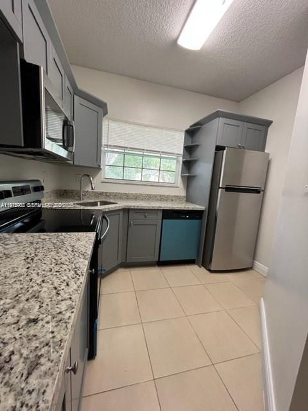 Photo of 1791 NW 96th Ter #4O, Pembroke Pines, FL 33024 (MLS # A11975908)