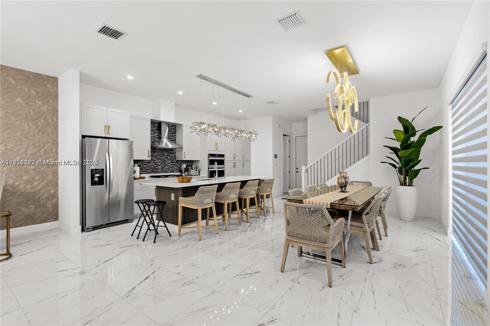 Exceptional 3BR/2.5BA single-family home with 2-car garage in sought-after Canarias at Downtown Doral. Prime location near MIA, top schools, highways, dining, and entertainment. Enjoy resort-style amenities: 40,000+ sq. ft. clubhouse with gym, pool, spa, yoga, indoor court, kids’ room, lounge, plus parks, trails, tennis, and events. Home offers open-concept layout, high ceilings, smart tech, gourmet kitchen, and luxe master suite. Urban living with a suburban feel in one of Doral’s most desirable communities.