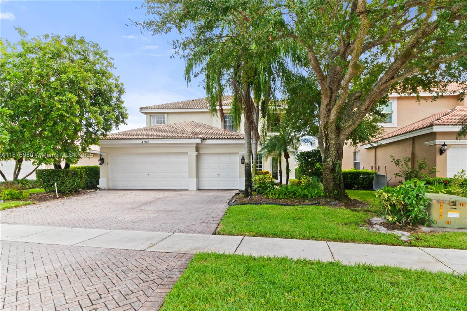Welcome to Wellington Shores! This spacious 5BR/3BA lakefront home offers nearly 3,000 sq ft of living space and a bright, open layout. Recent updates include elegant new flooring throughout the ground level, fresh interior paint, and a fenced backyard perfect for pets and outdoor enjoyment. The modern kitchen flows to expansive living and dining areas, while upstairs bedrooms provide comfort and privacy. Enjoy tranquil lake views, community clubhouse amenities, and one of the most walkable locations in Wellington, just minutes to Panther Run Elementary and Polo Park Middle School. A rare blend of lifestyle, location, and upgrades!