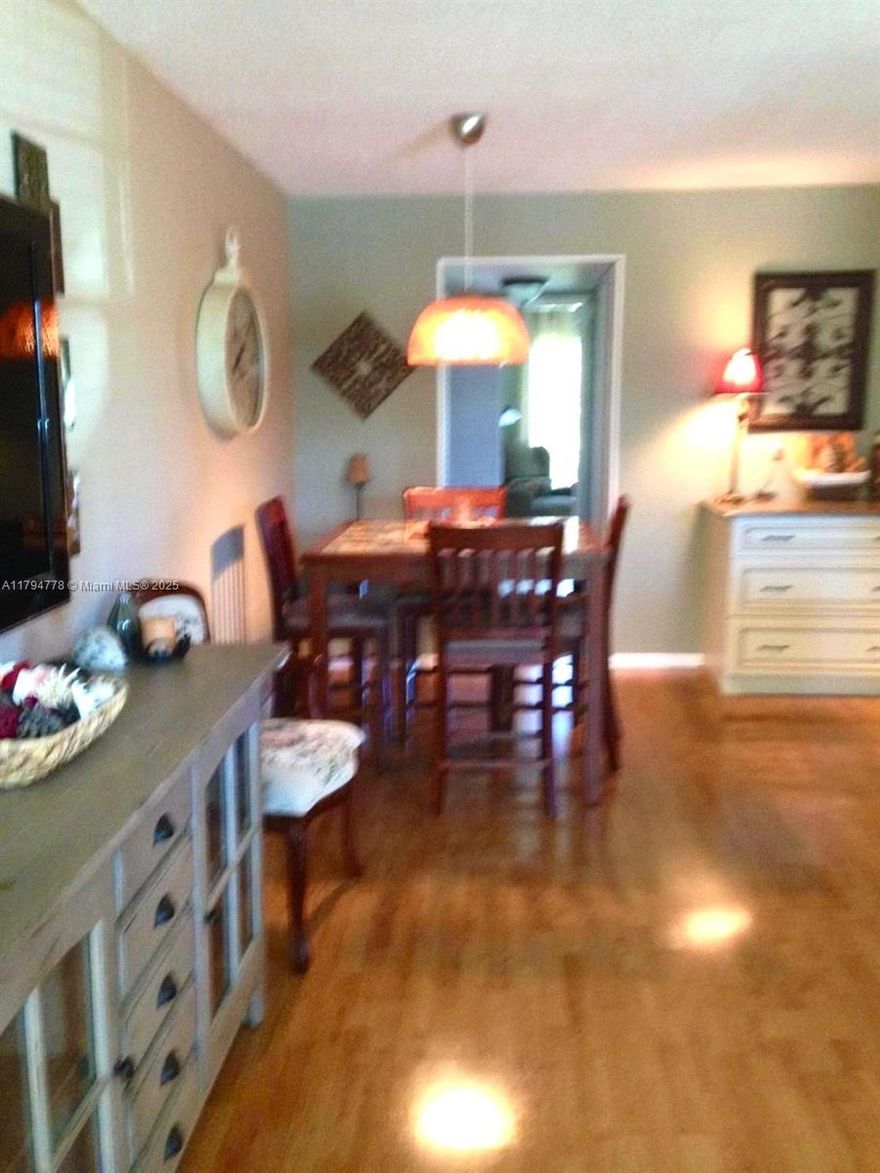 Charming and well-maintained 1-bedroom, 1.5-bath condo in the desirable 55+ Century Village community! This second-floor unit offers peaceful garden views, updated flooring, and a bright, open living space. Enjoy the convenience of a half-bath for guests and a spacious primary suite with ample closet space. Community amenities include a clubhouse, fitness center, indoor/outdoor pools, transportation services, and more. Located minutes from shopping, dining, and beaches. A perfect seasonal getaway or year-round home!