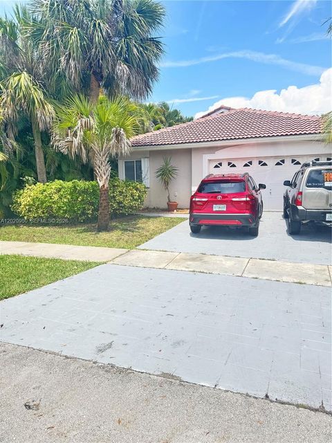 Photo of 131 SW 178th Way, Pembroke Pines, FL 33029 (MLS # A12020950)