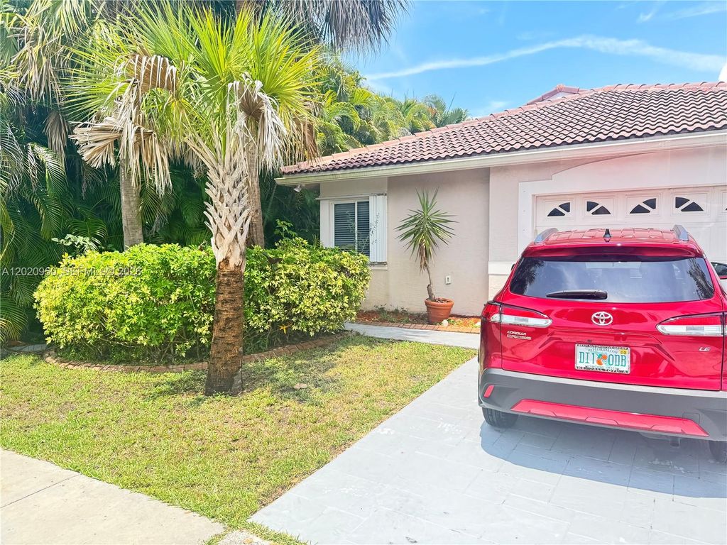 Photo of 131 SW 178th Way, Pembroke Pines, FL 33029 (MLS # A12020950)