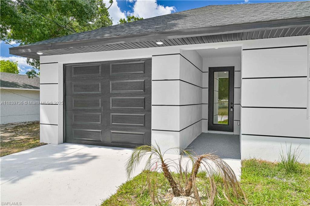 New Construction | 4 Bedrooms | 2 Full Baths | 1 Half Bath | 1 Car Garage | Volume Ceilings | Recessed Lights 8 Foot Doors | Tile Throughout | Granite Kitchen | Stainless Appliances | Impact Windows & Doors.