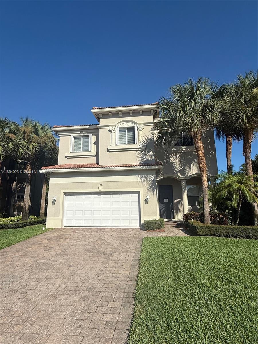 Discover an exceptional opportunity at 1061 Grove Park Circle. Mediterranean-style single-family home nestled within the highly desirable Palmyra Estates PUD in Boynton Beach. Built in 2005, this spacious residence spans approximately 3,119 square feet and offers a blend of elegance, comfort, and modern convenience.