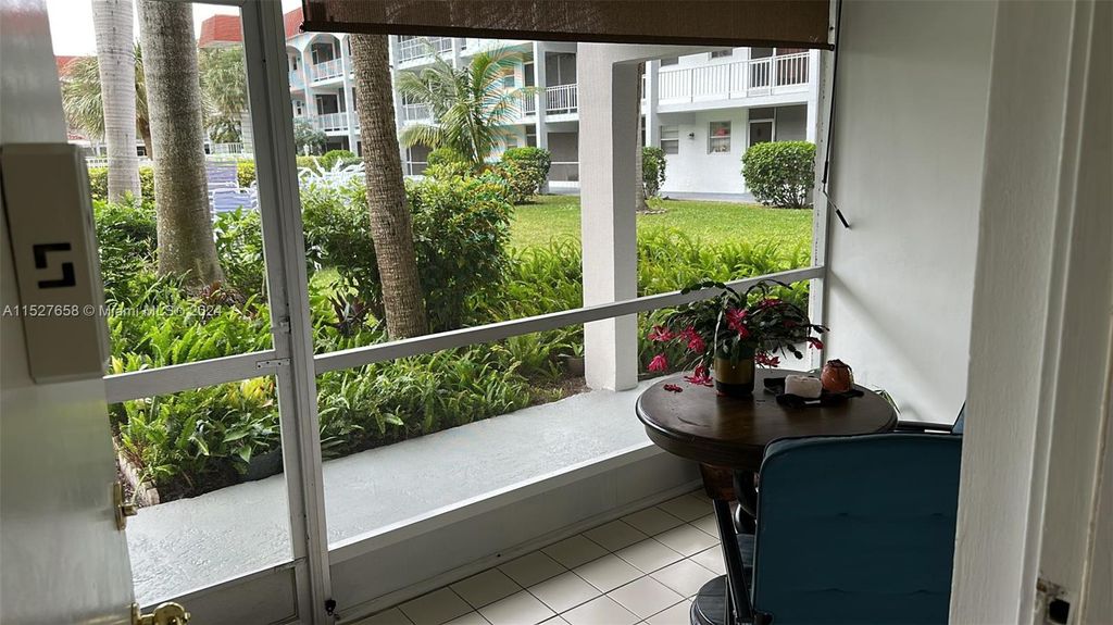 Photo of 581 Blue Heron Dr #107-B, Hallandale Beach, FL 33009 (MLS # A11527658)