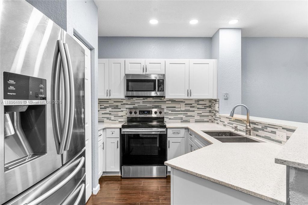 Photo of 6604 Catalina Ln, Tamarac, FL 33321 (MLS # A11896469)