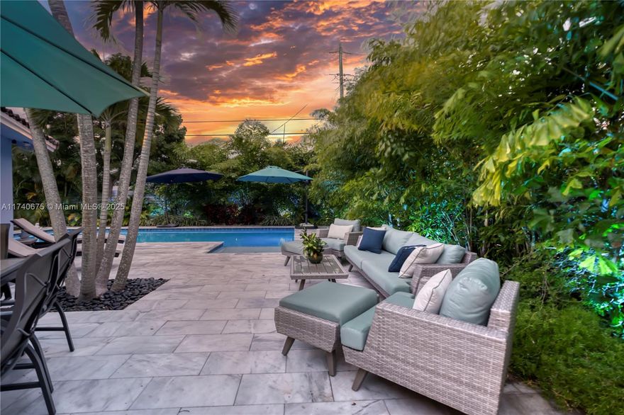 Live like you're on vacation at Sunset Retreat, a fully renovated 3-bed, 2-bath pool home on an oversized corner lot in vibrant Wilton Manors. This stylish and move-in-ready oasis offers luxury vinyl flooring, impact windows & doors, and an updated spa-like primary bathroom with modern finishes. Updated kitchen featuring quartz countertops, a massive island, & brand-new stainless steel appliances. Step outside to a lush, private backyard with a newly updated driveway, heated saltwater pool, marble patio, tropical landscaping, and new irrigation system. Additional upgrades include a new water heater, washer/dryer, and full privacy fencing. Located minutes from beaches, shops, restaurants, Wilton Drive, and Fort Lauderdale’s nightlife. Perfect as a personal retreat or rental investment.