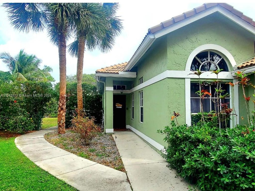 Photo of 8442 NW 57th Dr, Coral Springs, FL 33067 (MLS # A11615922)