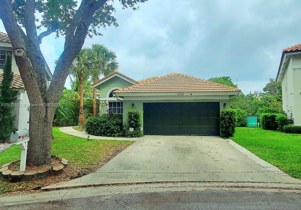 Photo of 8442 NW 57th Dr, Coral Springs, FL 33067 (MLS # A11615922)