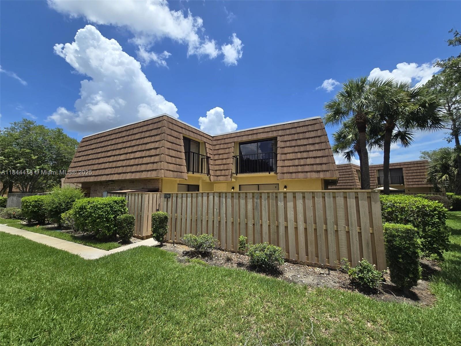 Discover peaceful lakeside living in this light-filled, end-unit condo at Cypress Court. With 2 bedrooms, 2.5 baths, and a spacious 1,285 sqft layout, enjoy morning coffee on your private patio or upstairs balcony overlooking the water. Corner parking, access to pool & tennis courts, and low maintenance living make this an ideal lock-and-leave or investment property. Conveniently located near top attractions, dining, and major highways—combine serene retreat with city conveniences