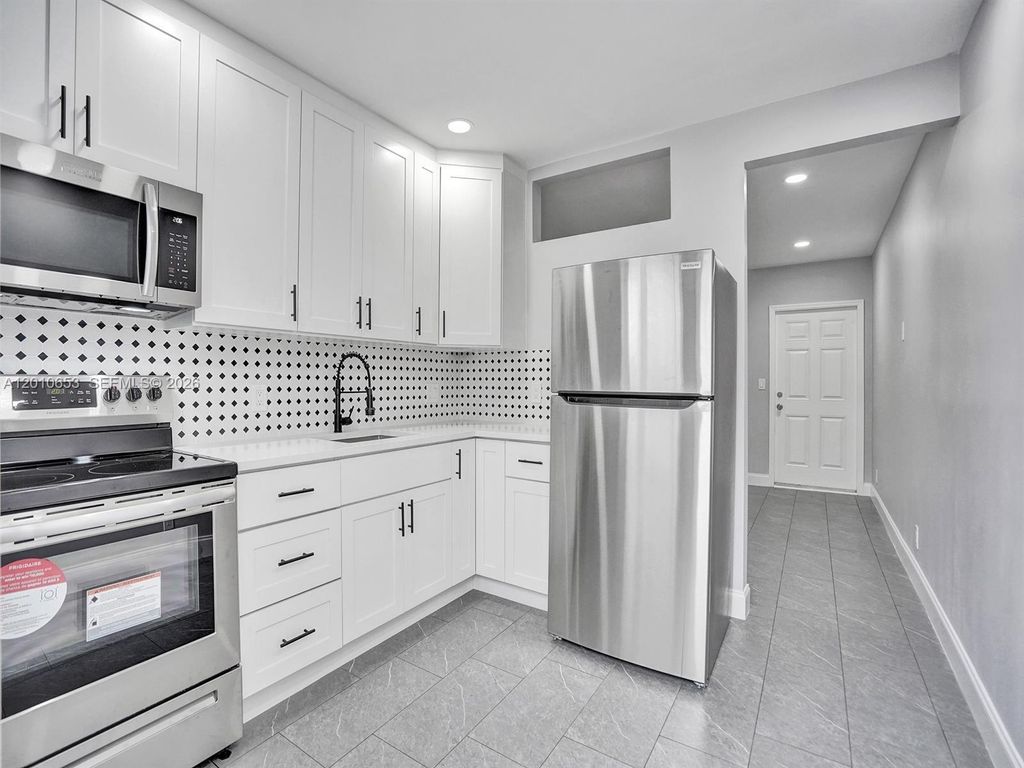 Photo of 951 SW 30th St #1-2, Fort Lauderdale, FL 33315 (MLS # A12010653)