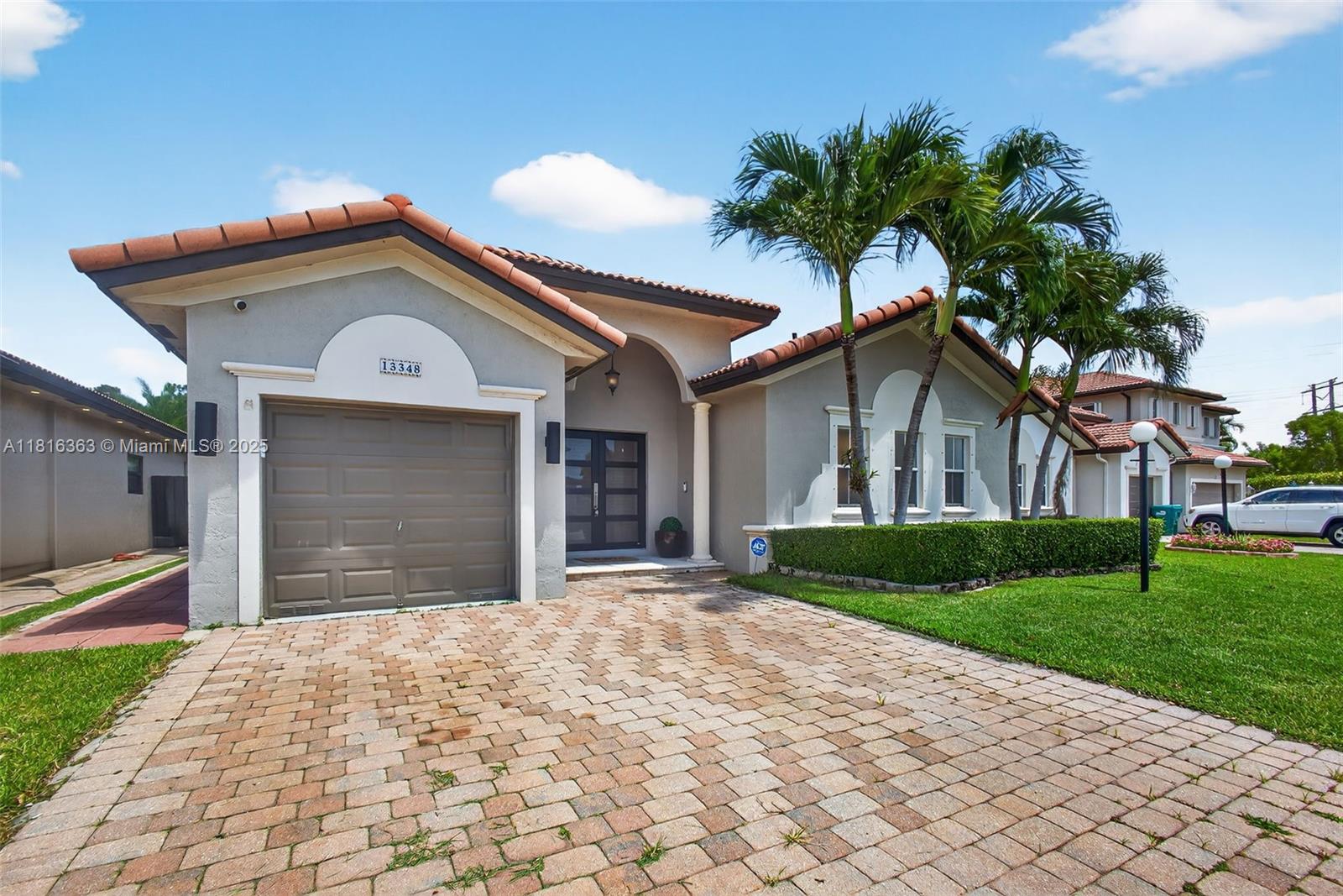 Step into luxury with this beautifully updated home located in the highly sought-after community of Bonita Lakes! This home features 3 bedrooms, + den that can be used as a 4th bedroom, and 2 updated bathrooms. Enjoy true South Florida living in your private backyard oasis, featuring travertine pavers, a pergola, and a saltwater pool—perfect for entertaining or relaxing in total comfort! The formal living room welcomes you with high ceilings and tons natural light and the primary suite offers a walk-in closet and a spa-like bathroom. Additional features include a 1-car garage, built in's in all closets, and complete impact windows and doors for storm protection, noise reduction, and energy efficiency! This is a rare find—don’t miss the opportunity to make it yours!