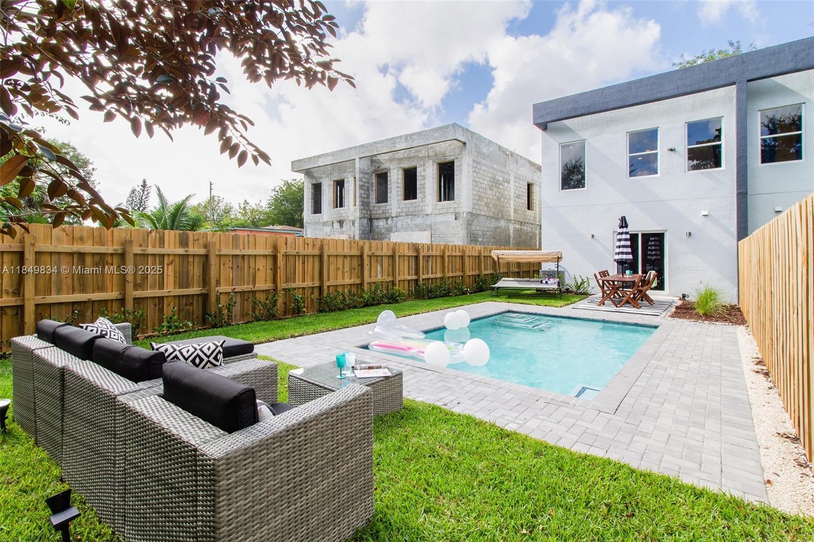Newly constructed pool house with 3 bedrooms and 2.5 bathroom, only minutes away from DOWNTOWN MIAMI, WYNWOOD, MIDTOWN and the DESIGN DISTRICT! This gorgeous town house comes complete with all new stainless steel appliances, washer and dryer. In the back you have a fenced in private pool that is great for entertaining guest and enjoying with the family. Call listing agent today and schedule a showing. NO AIRBNB OR SUBLEASING ALLOWED!