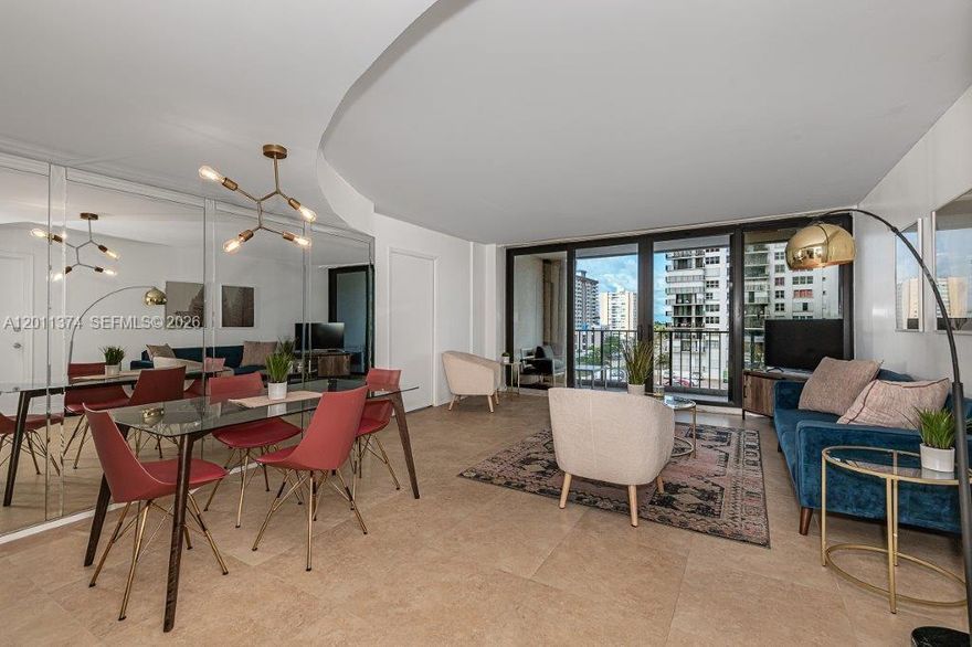 Tastefully furnished 2-bedroom, 2-bathroom condo at a great price! With tile floors, upgraded bathrooms, impact windows, and contemporary lighting, this apartment offers comfort and style. Plus, enjoy a partial ocean view that adds a touch of tranquility to your everyday living. Located in the Quadomain complex in Hollywood, it offers 5-star amenities: 2 heated pools, 2 gyms, sauna, ping pong, billiards, golf room, kids play area, beach chair service, an on-site restaurant, 24-hour security and valet parking. This is more than a home; it's a sanctuary where each detail has been meticulously curated for a life of comfort and sophistication. Make this remarkable condo your new Florida haven, where coastal living meets contemporary elegance.