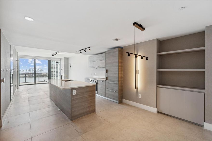 Spectacular 2-bedroom + 3-bath residence at the sought-after Paraiso Bay. Located on the 42nd floor, this unit offers breathtaking panoramic views of Biscayne Bay, the Atlantic Ocean, and the vibrant city skyline. Beautifully upgraded, featuring high-end finishes throughout. Enjoy world-class, resort-style amenities including the largest round pool in Miami, a private movie theater, bowling alley, state-of-the-art fitness center, spa, and more. Nestled in the exclusive Paraiso District — steps from convenience stores, trendy bars, the Design District, and some of Miami’s finest dining, including Michelin-starred restaurants. Unbeatable location: just minutes from Miami International Airport, Brickell, and Miami Beach. A true lifestyle opportunity!