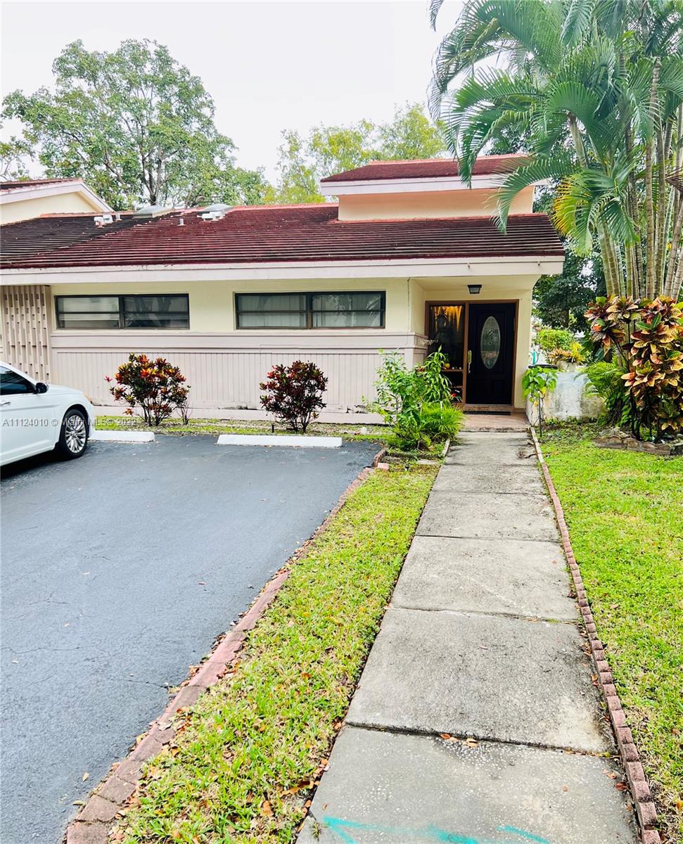 Beautiful Villa located in exclusive Jacaranda Country Club!!! This one won’t Last!! 3 large bedrooms, 2 full bathrooms. Lots of natural light. Amazing tall Vaulted Ceilings, updated kitchen with Granite countertops, Tile throughout and wood flooring in the bedrooms. Enjoy Beautiful Sunsets from your patio with Lake views!! 4 car driveway! Close to major highway, shops, restaurants, and so much more. A true piece of Paradise! Schedule your showing today!