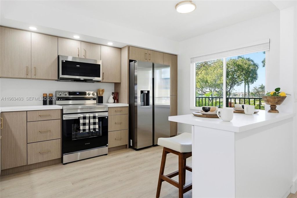 Photo of 901 SW 128th Ter #204A, Pembroke Pines, FL 33027 (MLS # A11963493)