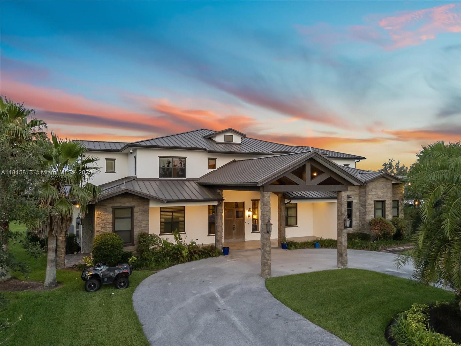 La Potencia II the an awe-inspiring lifestyle equestrian and hunting estate built in 2018 on near 378 acres in Port St. Lucie. Former Mets baseball star Céspedes built this 15,785 sq foot home, with amenity buildings total area is 31,056 square feet. Featuring six bedrooms, 4 bath and 2 half baths, soaring volume ceilings, a gourmet kitchen with cooking island, and expansive entertaining areas. Outdoors a 40x20 heated pool, spa, screened patio, and lush grounds create a private resort-style oasis. This modern home will keep you entertained all year long with baseball batting cage, game processing room, stable for 12 horses, office, horse training yards, hundreds of acres to ride your horses or go hunting for wild boar and other game. This property is near spring baseball training grounds.