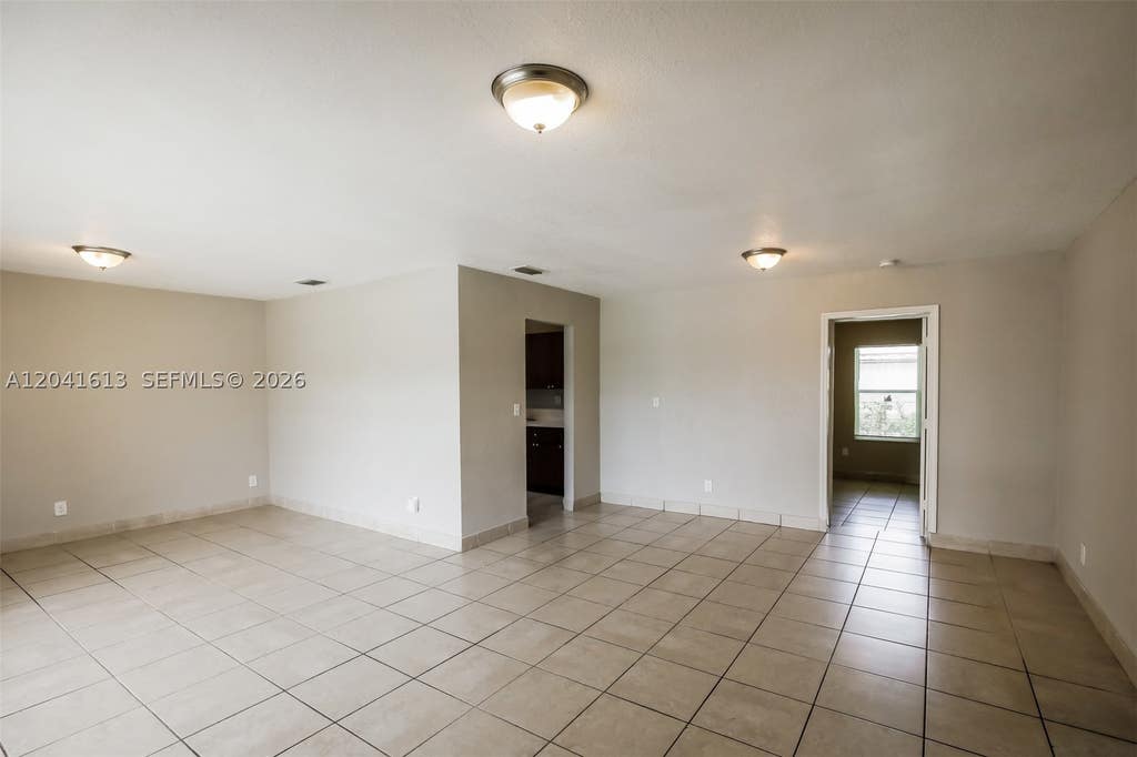 Photo of 3333 NW 32nd Ct, Lauderdale Lakes, FL 33309 (MLS # A12041613)