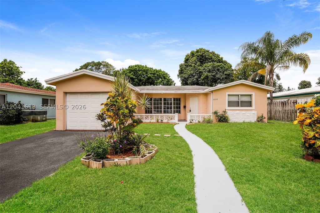 Photo of 3333 NW 32nd Ct, Lauderdale Lakes, FL 33309 (MLS # A12041613)