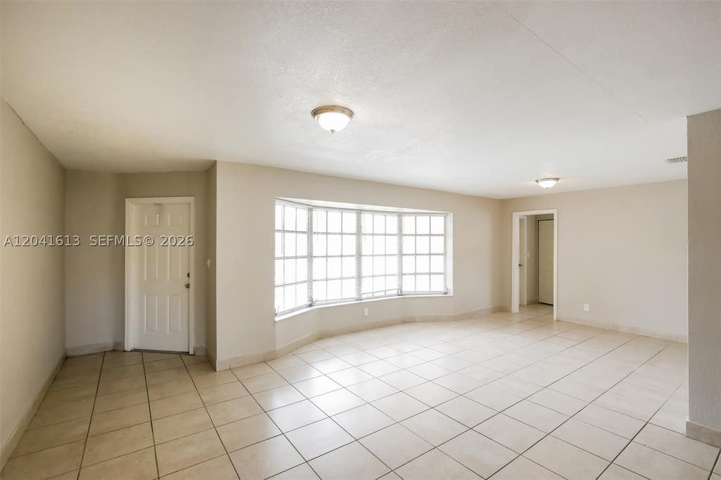 Photo of 3333 NW 32nd Ct, Lauderdale Lakes, FL 33309 (MLS # A12041613)