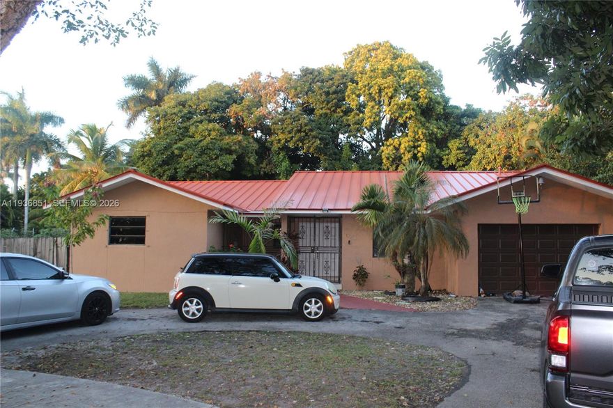 Welcome to this large, spacious 3/2 with an additional room that could be used as an office or an extra bedroom. The home sits on a spacious plot with a sprawling backyard and a two-car garage.  The interior boasts a sleek contemporary design.  A brand-new kitchen, with new flooring, offering a comfortable living space. Seated on a secluded cul-de-sac near the Biscayne River and less than two miles from I-95. Featuring a brand-new roof, 6 months old, circular driveway, and plenty of parking. The backyard offers endless possibilities and ample space for RVs, boats, additional parking, and outdoor enjoyment.