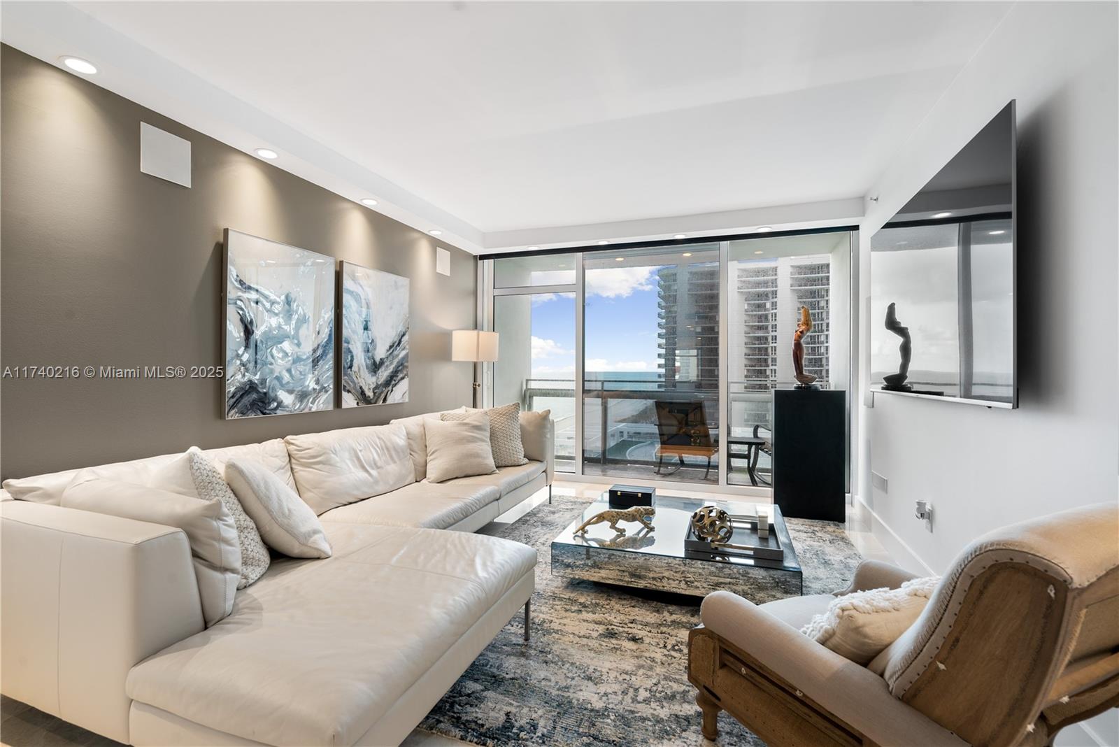 DIRECT OCEAN VIEWS. ABSOLUTELY SPECTACULAR. SOUTHEAST FACING 2+2 SOLD FULLY FURNISHED & FINISHED SPORTING GLEAMING MARBLE FLOORS THROUGHOUT, IMMACULATE GRANITE & STAINLESS STEEL KITCHEN AND THREE BALCONIES, ALL OVERLOOKING THE SWEET SANDS OF MIAMI BEACH & THE LAVISH CARILLON POOL DECKS. THE UNIT HAS EVERY ADVANTAGE, ELECTRIC BLINDS, FULLY EQUIPPED KITCHEN, SPARKLING BATHROOMS AND MORE. THE BUILDING IS MAGNIFICENT. RANKED IN THE TOP 10 DESTINATION SPA RESORTS IN THE U.S. BY CONDE NAST TRAVELER, THE CARILLON FULFILLS EVERY NEED, WANT & DESIRE. 5-STAR, 24/7 FITNESS FACILITY, FULL SERVICE SPA & WELLNESS CENTER, ROCK-CLIMBING WALL, SPINNING, YOGA & A MULTITUDE OF FITNESS CLASSES, THE BIOSTATION, FULL BEACH SERVICE, TWO DELECTABLE RESTAURANTS & MORE. SPA AND F&B CREDITS INCLUDED IN OWNERSHIP ..