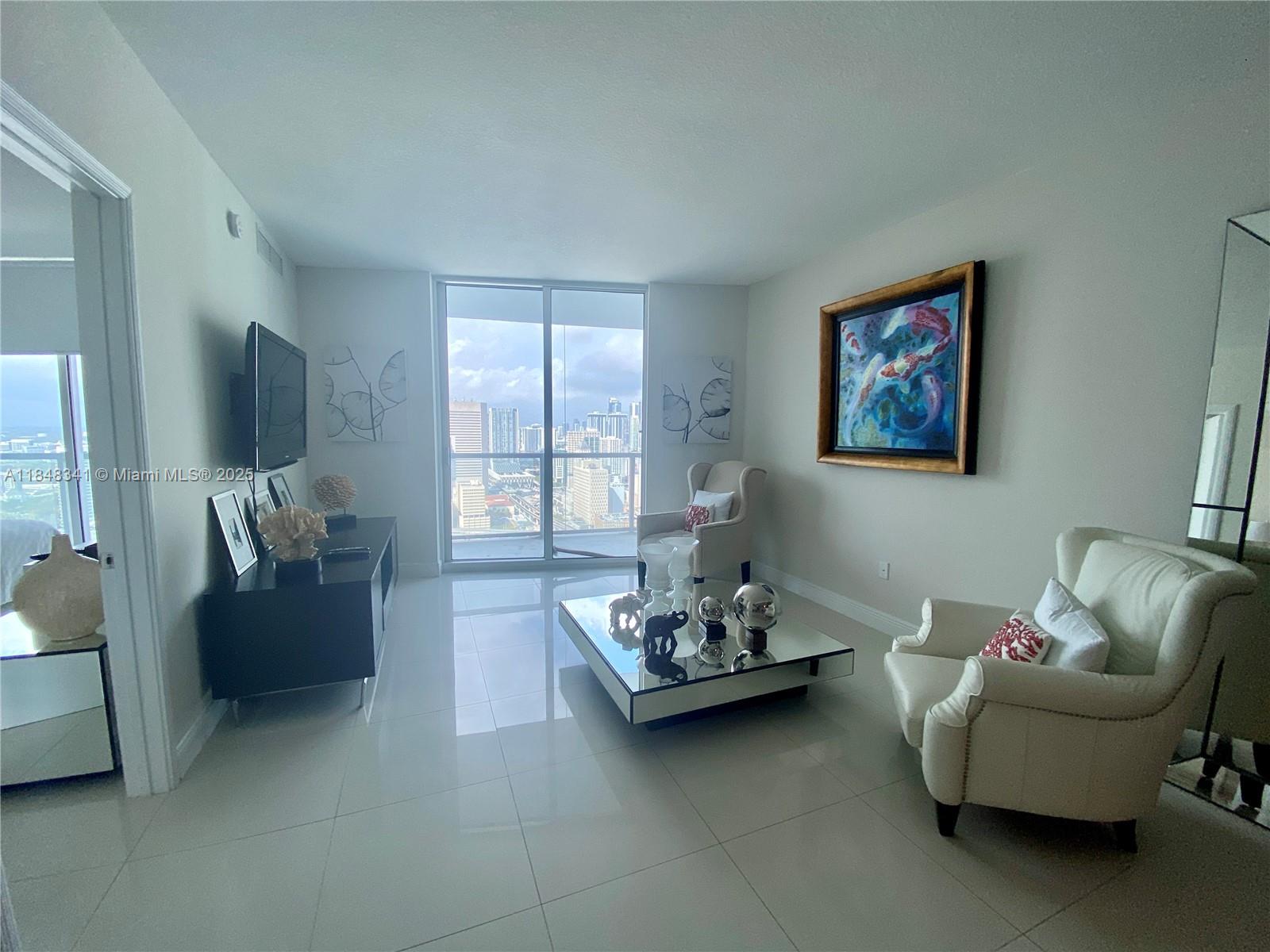 Very spacious 1 bed 1.5 bath plus den on a high floor facing the river. The unit is tiled throughout and has good storage space. The pool is still closed for repair for 6-9 months est. Small pets are allowed with $500 non refundable fee for the unit and $1000 refundable association pet deposit. Basic cable, internet and water are included. Free valet parking is included for one car $40 one time registration is charged by parking company. Assigned parking is available to rent for $200 a month plus tax. Motorcycle parking is also available for rent from the association. Applications take about 1 week. Good credit and verifiable income needed for approval.