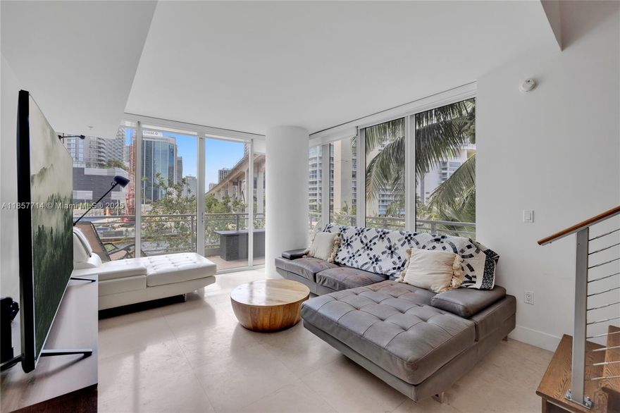 Discover urban tranquility in this 2 story 3 bed, 3 bath townhome perched directly on the river with stunning cityscape views. Embrace modern elegance with an open layout, copious amounts of natural light with floor to ceiling windows and a gourmet kitchen with stainless steel appliances. Additional amenities include 5-star common areas with spacious waterfront pool, jacuzzi, fitness center, spa, business center with meeting rooms, game room, kids playground, entertainment room, gated community with 24/7 concierge and a parking spot on the same floor just a few steps from your door. Experience luxury and convenience being steps from Miami's top restaurants, entertainment and cultural hotspots.