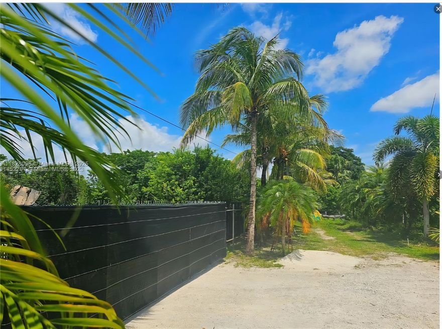 Looking to build your dream home? Look no further! This nearly 1-acre lot has easy access to Florida's Turnpike, just 30 minutes from Key Largo and 20 minutes from Miami.  Surrounded by million dollar homes, makes it a perfect land to build.! You'll enjoy the peaceful lifestyle while still having access to new shopping and entertainment areas nearby. Or if you prefer to use it as it is right now with 200 trees including Coco, Day Palms, avocado, rubolinis and mango trees feel free to do so. Possibilities are endless!!
