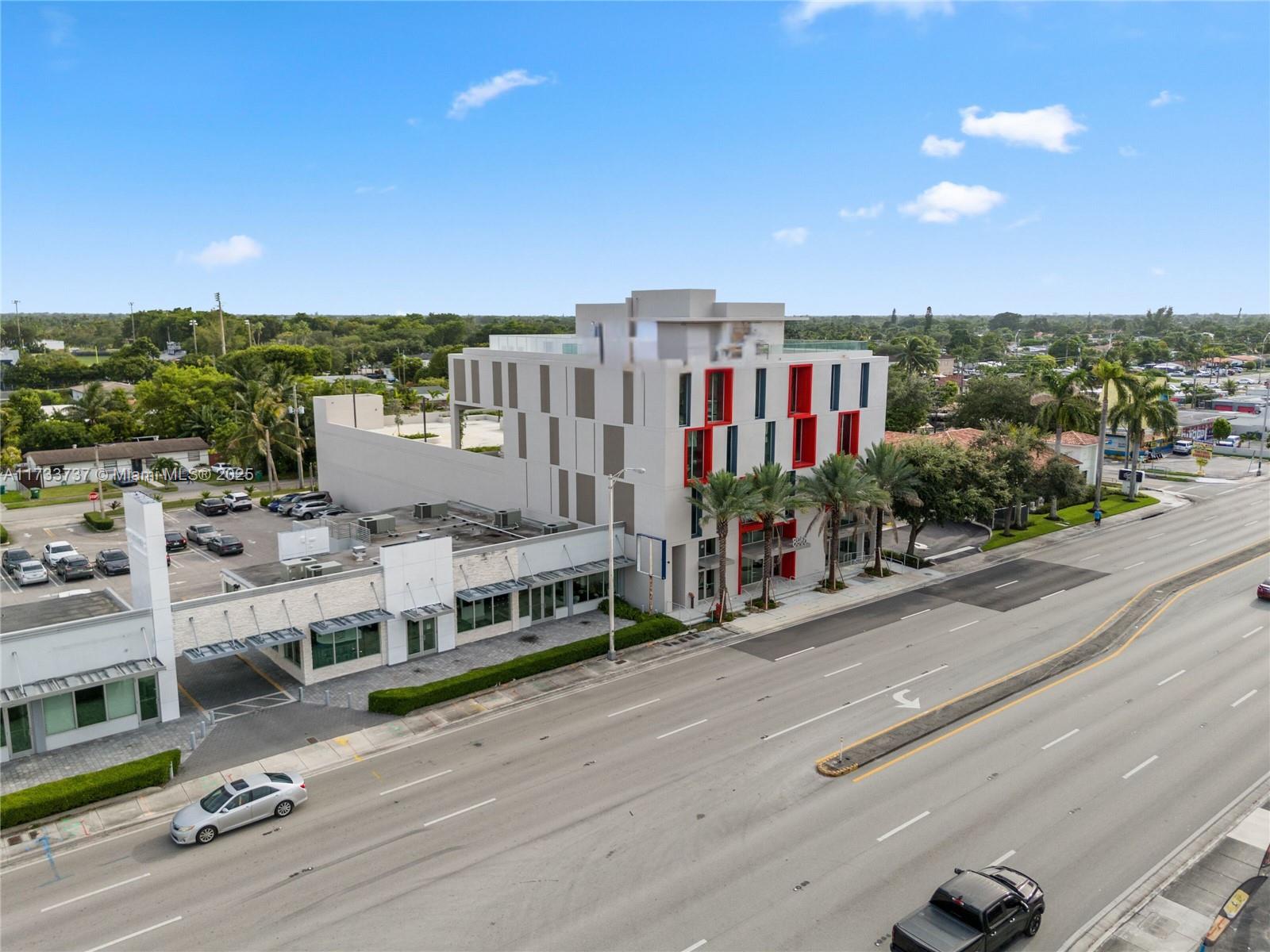Class "A" new construction building, situated on the Bird Rd Corridor just west of the Palmetto Expressway, offers 45,829sqft of versatile space for retail, office, or medical use. The 4-story structure features 3,021sqft of retail space on the 1st floor and 12,808sqft of office space on the second through 4 floors. It includes a 24,127sqft parking area with a 43-space garage, expandable to 80 spots with valet, a 1,500 sqft covered canopy on the roof, 60k+ daily traffic count, ensuring maximum exposure, multiple side-seen faces for signage 100x50 ft of exposure and XL stainless finish elevators for stretchers or medical equipment. Suitable for a range of uses such as primary care, urgent care, imaging, labs, social services