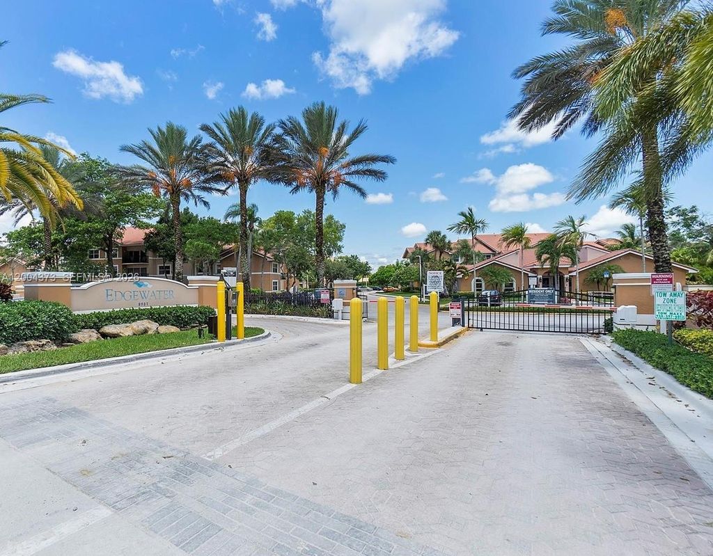 Photo of 8761 Wiles Rd #306, Coral Springs, FL 33067 (MLS # A12004373)