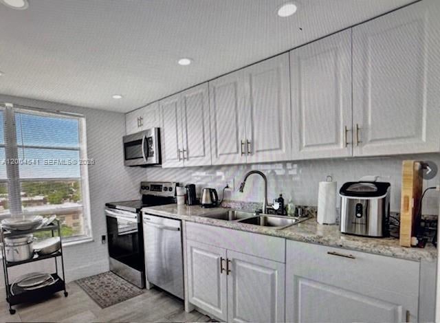 Photo of 4174 Inverrary Dr #914, Lauderhill, FL 33319 (MLS # A12004541)
