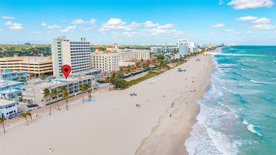 Direct Ocean View at Seahorse Oceanside on the Hollywood Beach Broadwalk. Building inspections completed. Parking is well addressed for beach living. This bright one-bedroom, two-bath condo features a private balcony with ocean views, where you can hear the waves when the sliding door to the balcony is open. The unit includes an in-unit washer and dryer and is located in a boutique three-story building offering a heated rooftop pool and one assigned-covered parking space, plus a public parking garage just a three-minute walk away. Step directly onto the beach and enjoy easy access to nearby dining, cafes, Margaritaville, and other popular attractions. Ideal as a full-time residence, vacation retreat, or income-producing property. The building allows immediate rentals up to three times per year with a ninety-day minimum, making it attractive for investors and seasonal owners. Seller is open to reasonable offers and responsive to market feedback. Listing information deemed accurate but not guaranteed; buyers should verify.