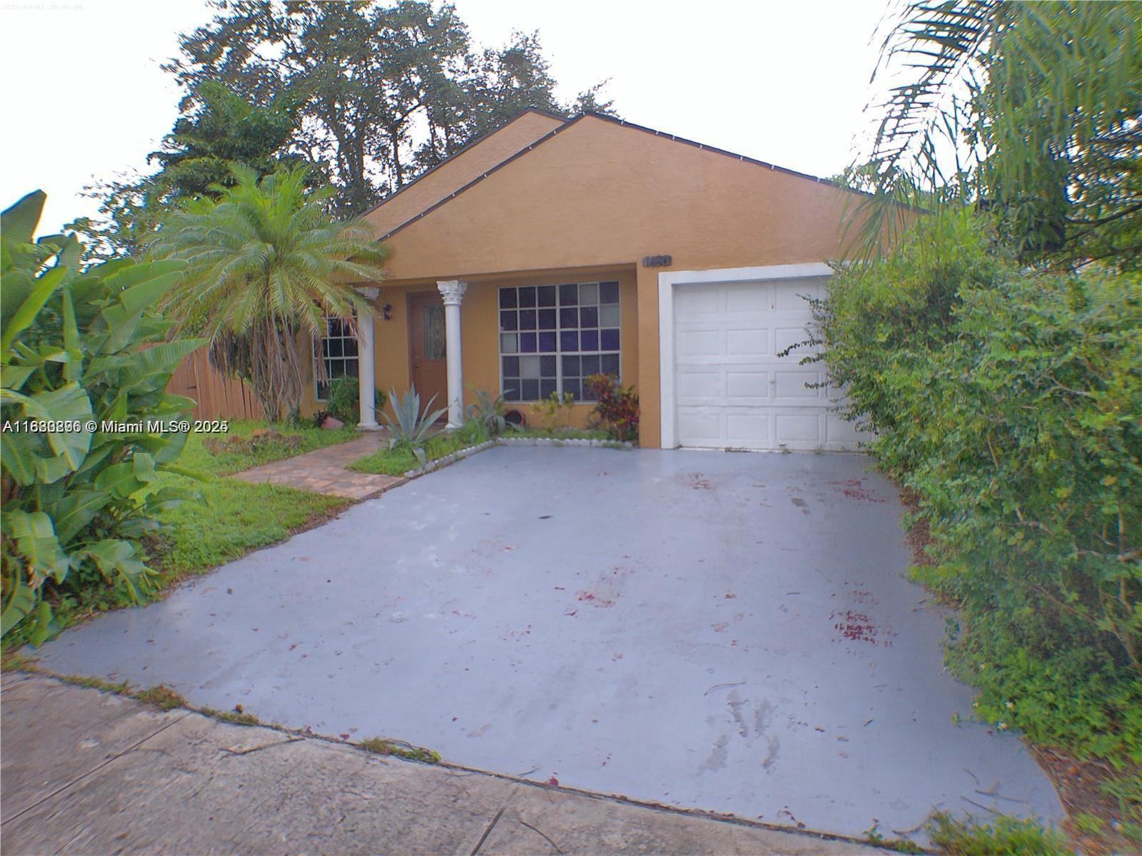 BEAUTIFUL HOUSE IN PEMBROKE PINES WITH PARTIALLY CONVERTED GARAGE INTO 4TH BEDROOM, PLEASE DO NOT MISS THIS ONE. THE CHEAPEST HOUSE IN PEMBROKE PINES. CALL YOUR BROKER FOR SHOWING.