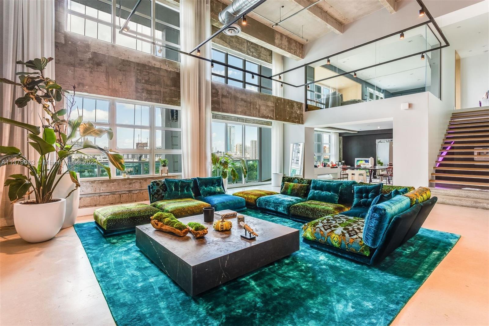 This wonderfully spacious light filled NY style loft will wow you from the moment you enter the front door. The large open living space overlooks a very spacious dining area and custom ValCucine Kitchen. Upstairs is the huge primary suite including a TV/sitting area, large bathroom and custom walk-in closet. The building features all the must have amenities including a doorman,
sundeck, pool and gym. The location of the building is walkable to Wynnwood and one of the best dog parks around. Across the street there is a wonderful co working space and coffee shop. This 2 bedroom 2 bath can easily be converted into a 3 bedroom if needed.