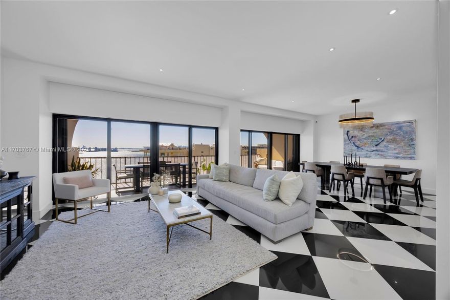 SELLER FINANCING AVAILABLE. New York chic meets Miami! This impeccably remodeled PH unit with 10’ ceilings was remodeled sparing no expense + feels like a luxury home in the sky! 2 BEDS, 2.5 BATHS + DEN features open living areas w/ a chef’s kitchen w/ 2 ovens, huge fridge + separate freezer & walk-in pantry, private master suite w/ walk-in closet, ALL impact windows + remodeled bathrooms (including a steam shower). Breathtaking views of the wide water & Miami Beach skyline! The great room opens to a 30' long balcony for an additional outdoor living room. Bldg amenities incl. a resort-style Bayfront pool, gym, 24 hour doorman + bellman, valet, lobby bar, children’s playground + tennis & basketball courts. Located w/in a 10 MIN DRIVE FROM THE BEACH + near all the local shops + restaurants.