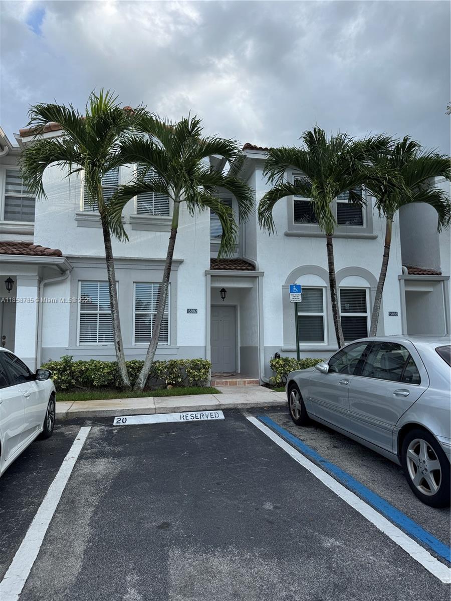 Welcome to your dream townhouse in a gated community in Miramar! This stunning property boasts 3 bedrooms, 2.5 bathrooms, and a host of luxurious upgrades. Step inside to find a newly renovated space with brand new large tile flooring on the first floor and stylish vinyl flooring on the second floor. The kitchen is a chef's delight with stainless steel appliances and a new stainless range that will make cooking a breeze. The entire unit has been freshly painted, giving it a modern and inviting feel. The new air conditioning unit ensures that you will stay cool and comfortable all year round. Outside, you can relax and unwind in the community pool, perfect for those hot summer days. Great location and great schools!