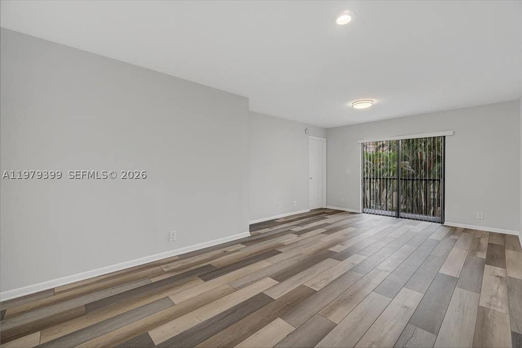 Photo of 6832 S Palmetto Cir S #201, Boca Raton, FL 33433 (MLS # A11979399)