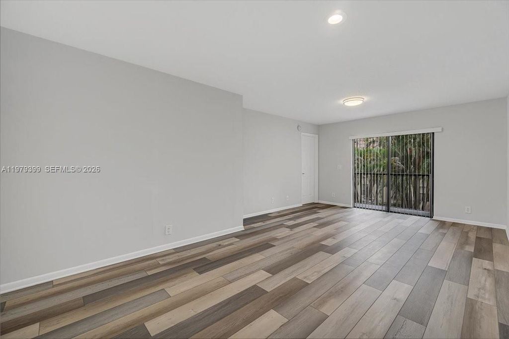 Photo of 6832 S Palmetto Cir S #201, Boca Raton, FL 33433 (MLS # A11979399)