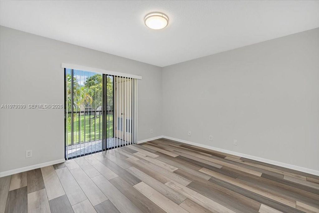 Photo of 6832 S Palmetto Cir S #201, Boca Raton, FL 33433 (MLS # A11979399)